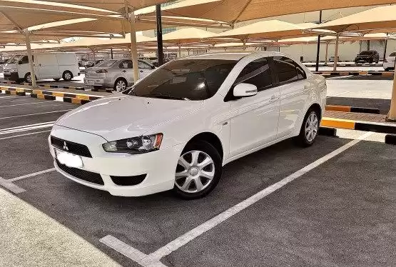 مستعملة Mitsubishi Lancer للبيع في الدوحة #10454 - 1  صورة 