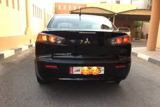 مستعملة Mitsubishi Lancer للبيع في الدوحة #10774 - 1  صورة 