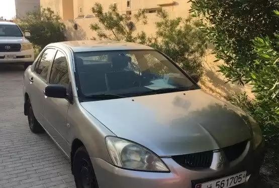 مستعملة Mitsubishi Lancer للبيع في الدوحة #10884 - 1  صورة 