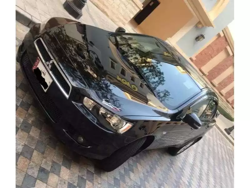 مستعملة Mitsubishi Lancer للبيع في الدوحة #11707 - 1  صورة 