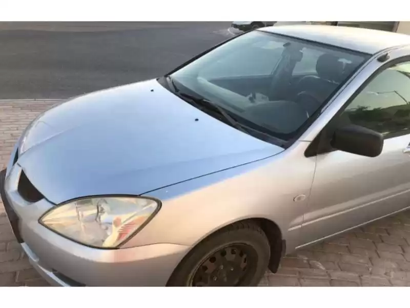 مستعملة Mitsubishi Lancer للبيع في الدوحة #11918 - 1  صورة 