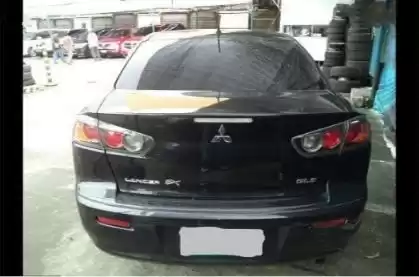 مستعملة Mitsubishi Lancer للبيع في الدوحة #12689 - 1  صورة 