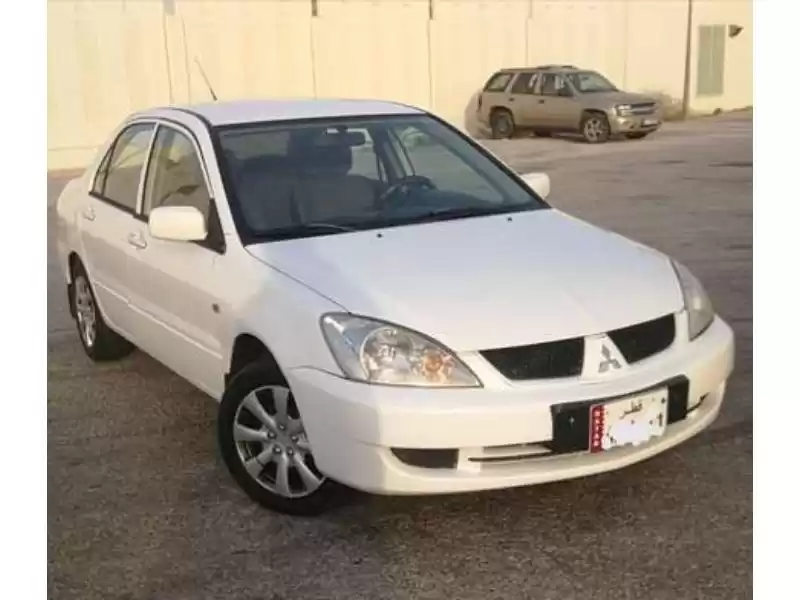 Usado Mitsubishi Lancer Venta en Doha #12778 - 1  image 