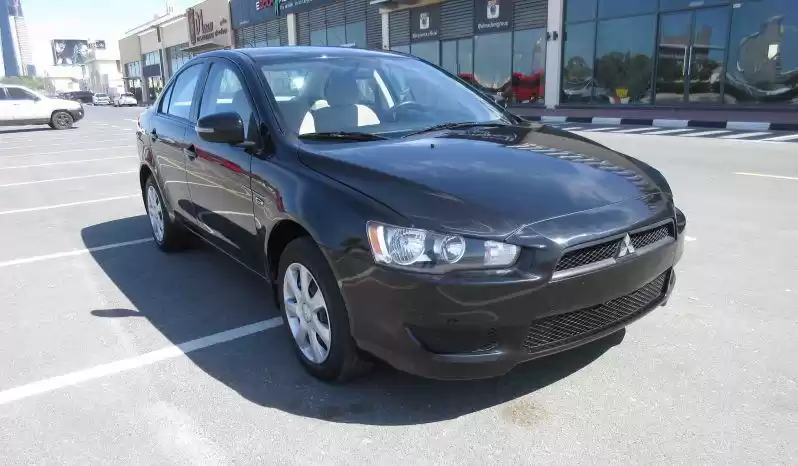 مستعملة Mitsubishi Lancer للبيع في دبي #19045 - 1  صورة 