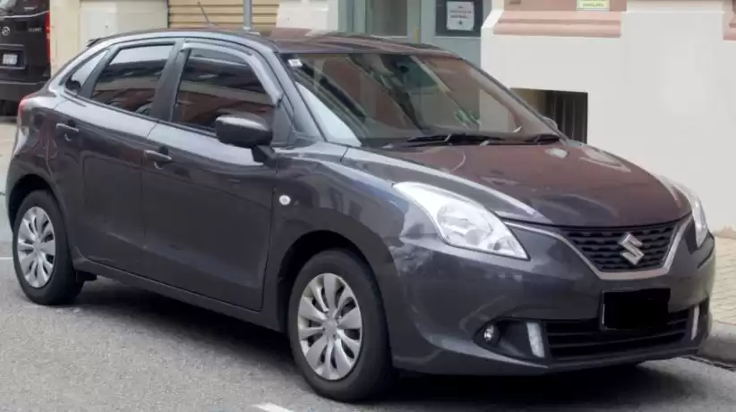 مستعملة Suzuki Baleno للإيجار في دبي #20182 - 1  صورة 