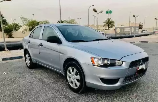 مستعملة Mitsubishi Lancer للبيع في الدوحة #8566 - 1  صورة 
