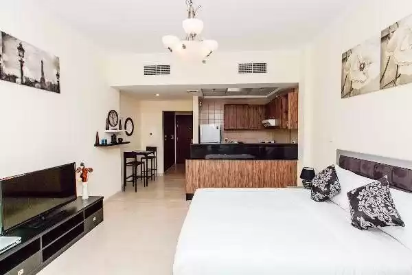 سكني عقار جاهز ستوديو مفروش شقة  للإيجار في دبي #24053 - 1  صورة 